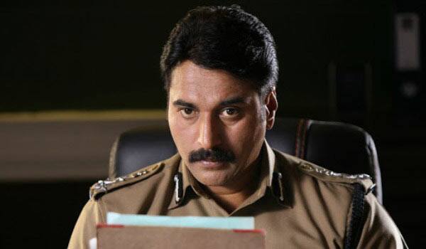 Actor-Rahman-acting-in-police-role