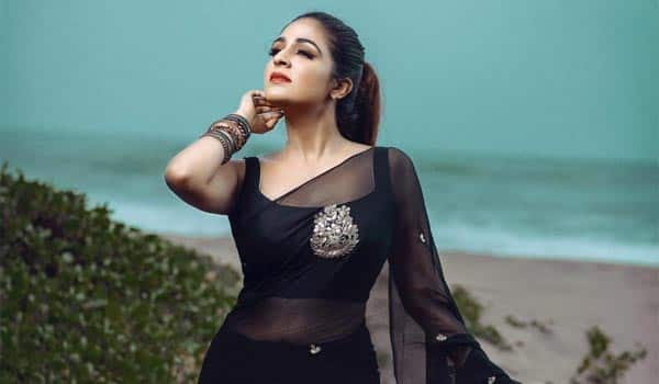 Malavika-Wales-in-black-saree