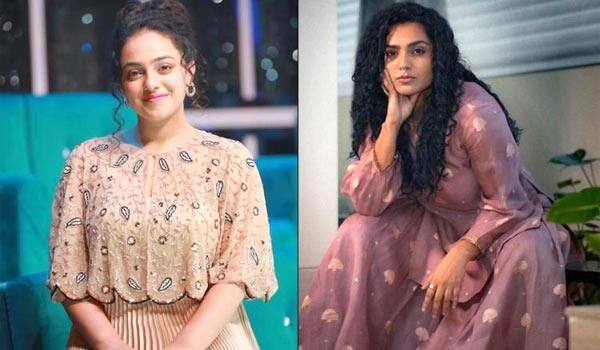 Parvathy---Nithaya-Menon-Publicity-for-movie