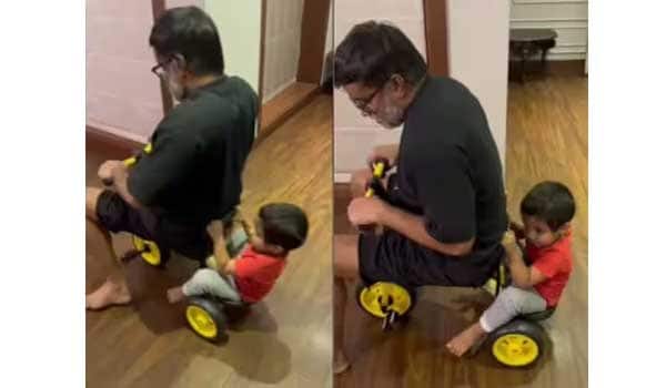 Selvaraghavan-riding-his-son-cycle-funny-video-viral