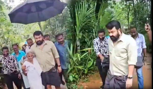 Viral-video-shows-Mohanlal-accepting-invitation-for-duck-curry-from-elderly-fan