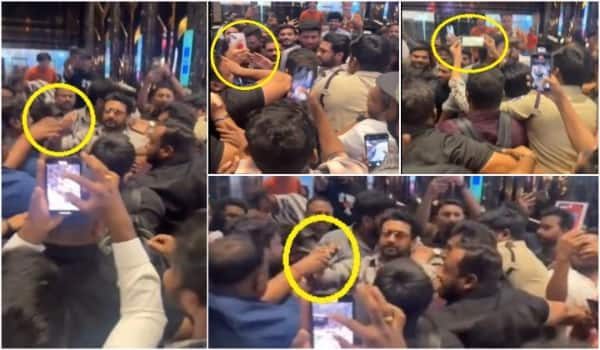 Suriya-took-a-selfie-by-pulling-a-fan-who-was-pushed-away-by-the-bouncers