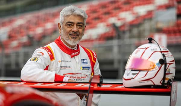 Ajith-decides-to-continue-racing