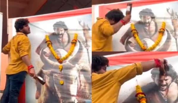 Mahesh-Babu-fan-breaks-bottle-on-his-head-and-applies-blood-tilak-on-poster