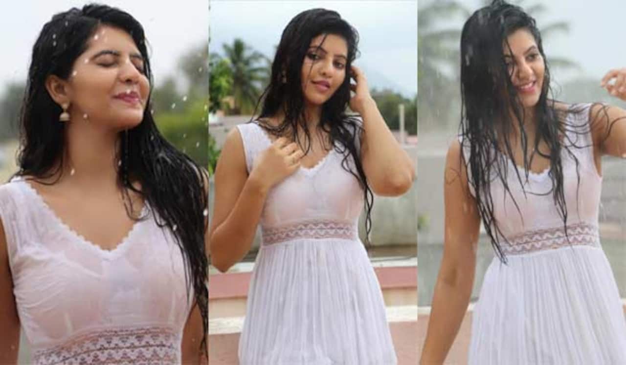 மழைச்சாரலில் கவர்ச்சி மயமாக அதுல்யா ரவி