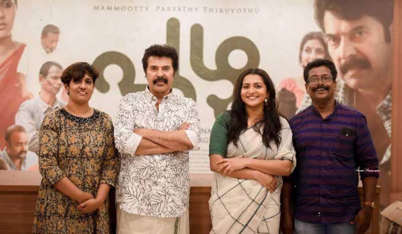 புழுவின் வெற்றியை கொண்டாடிய மம்முட்டி பார்வதி