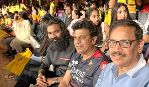 பெங்களூரு மைதானத்தில் சிவராஜ்குமாருடன் கிரிக்கெட்டை ரசித்து பார்த்த தனுஷ்