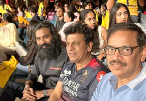 பெங்களூரு மைதானத்தில் சிவராஜ்குமாருடன் கிரிக்கெட்டை ரசித்து பார்த்த தனுஷ்