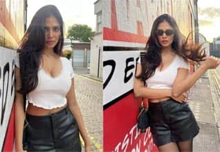 சுற்றுலா சென்ற இடத்தில் போட்டோசூட் நடத்திய மாளவிகா மோகனன்!