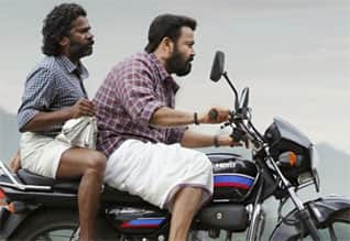 தொடரும் பட போஸ்டர் மூலம் ஹெல்மெட் விழிப்புணர்வு ; போலீஸுக்கே பூமராங் ஆக திரும்பிய கருத்துக்கள்