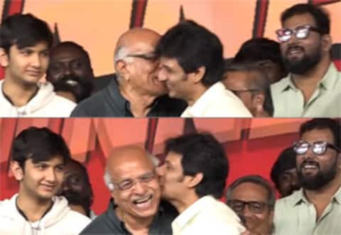 பிஎம்டபுள்யூ கார் கொடுத்தார் ஜீவா : முத்தம் கொடுத்தார் ஆர்.பி.சவுத்ரி
