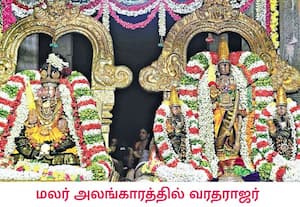 ஸ்ரீதேவி, பூதேவியருடன் காஞ்சிபுரம் வரதராஜ பெருமாள், மலர் அலங்காரத்தில் ...