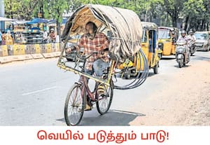 கடுமையான கோடை வெயிலின் தாக்கத்திலிருந்து தப்ப தன் சைக்கிளில் நிழற்குடை ...