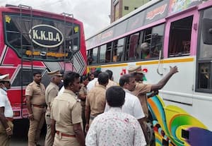 பஸ்கள் மோதியதில் கண்ணாடி சேதம்