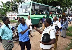 ﻿ பஸ்சின் கதவு திறந்ததற்கு அபராதம் பரிசோதகருடன் டிரைவர் வாக்குவாதம்