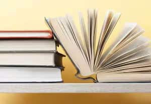 ﻿ தாலுகா நுாலக கட்டுமான பணி முடக்கம்:வாசகர்கள் போட்டி தேர்வாளர்கள் அவதி