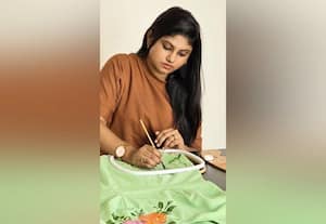 அற்புத ஆடை வடிவமைப்பாளர் சூர்யா