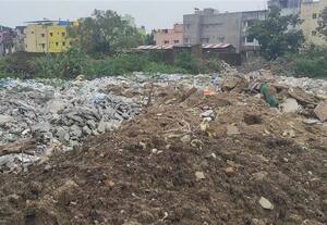  குடியிருப்பு அருகே குப்பை, கட்டட கழிவு கொட்டுவதால் நந்தம்பாக்கத்தில் தவிப்பு