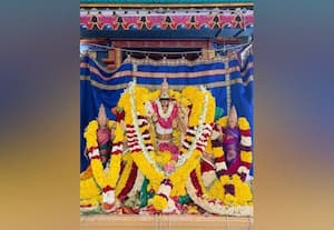 சாமந்தி பூ அலங்காரத்தில் முருகன்