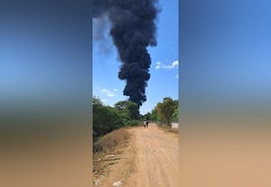  தீ விபத்தால் எழுந்த புகை