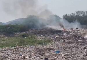  முடிச்சூர் ஏரி கரையில் குப்பை கொட்டி தீ வைப்பு: வண்டலுார் மக்கள் கடும் அவதி
