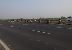  சுற்றி செல்வதை தவிர்க்க சாலை மையத் தடுப்பு அகற்றம்