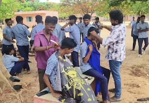 Teacher who gave students haircuts at his own expense