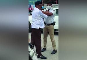  நடுரோட்டில் ஏட்டு மீது தாக்கு ம.ஜ.த., மாநில செயலர் கைது