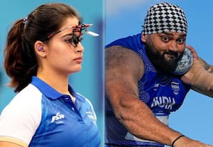 ஆசிய விளையாட்டு போட்டி; இந்திய தேசியக்கொடியை ஏந்தி செல்லும் மனு பாகர், தஜிந்தர் பால் சிங்
