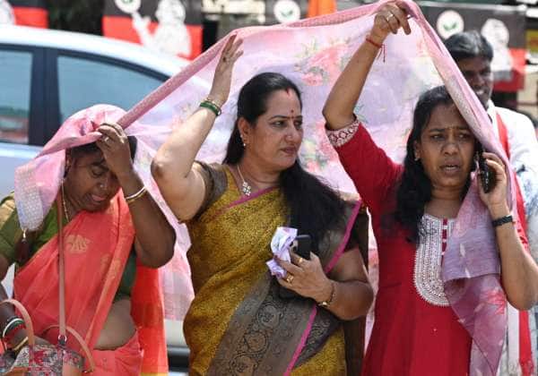 வாட்டி வதைக்கும் வெயிலிருந்து, பெண்கள் தங்களை காத்துக் கொண்ட இடம் கோவை ஒண்டிப்புதூர்.